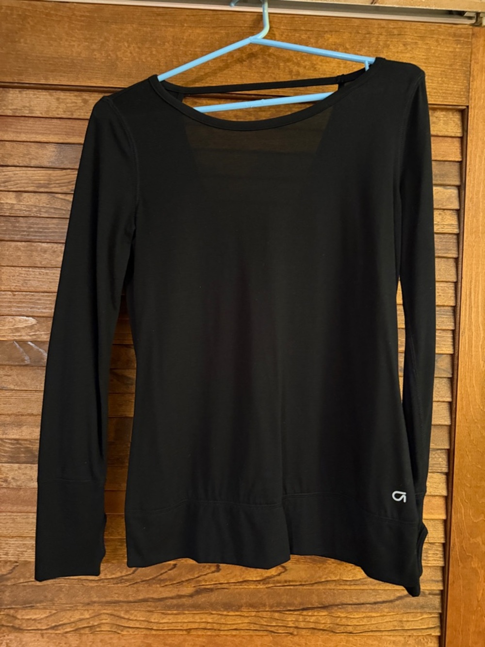 Black Long-Sleeve Women's Top with open Back Strap Detail